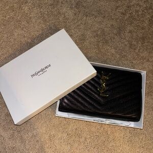 Yves Saint Laurent Black Quilted Clutch with Gold Accent